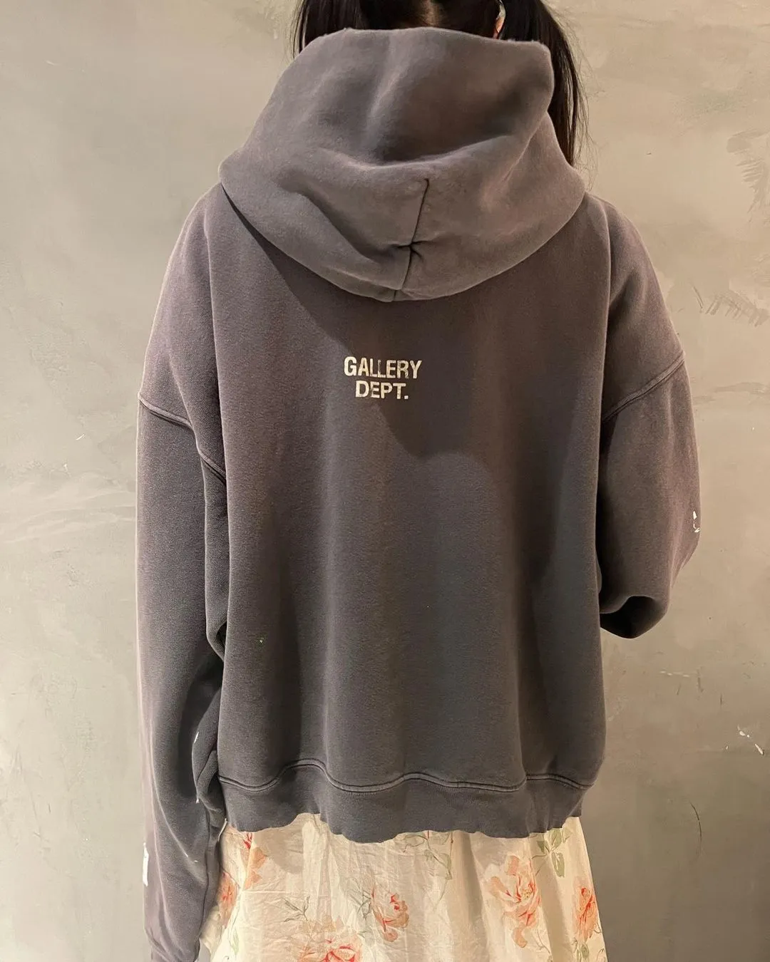 GALLERY DEPT. 90'S RECYCLE HOODIE WASHED BLACK 90'S washed hoodie with distressed eco-friendly slogans. Washed black S-XL. Ready-made garments are washed and dyed again. Multiple spots throughout the body are spray-faded. The ribs are cut and worn.